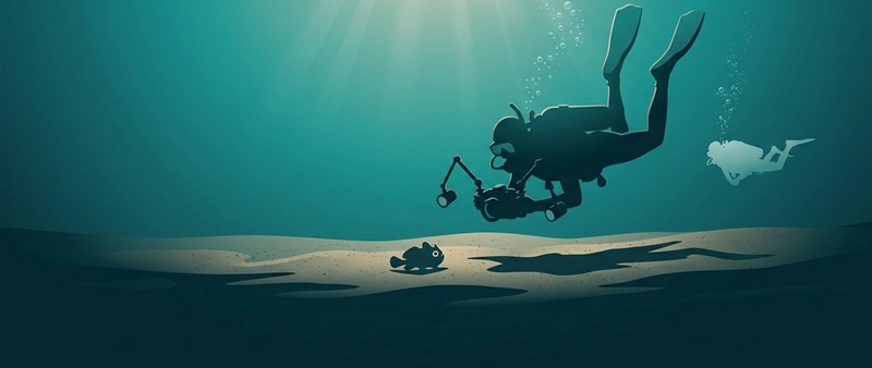 Illustration of a diver with camera and strobes photographing a small creature